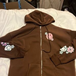 Smiley face brown jacket